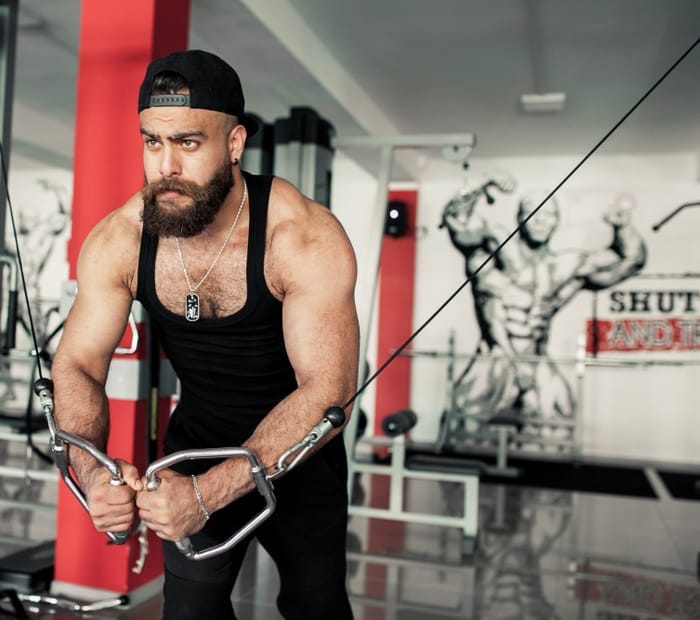 Athlete performing a cable strength exercise
